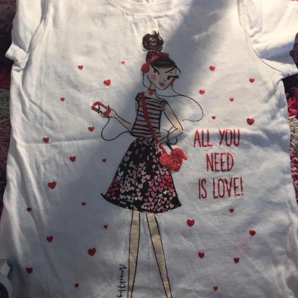 Cute Valentine’s Day shirt (won’t com wrinkled).